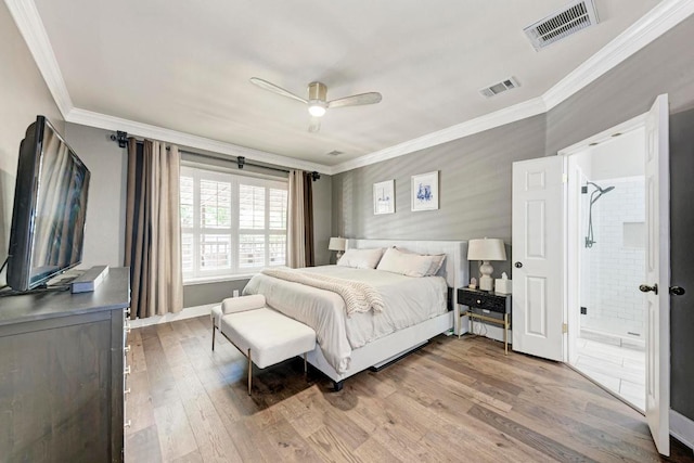 2407 Powderham Ln S, Cedar Park, TX 78613 - bedroom with ornamental molding, wood finished floors, connected bathroom, ceiling fan, and baseboards