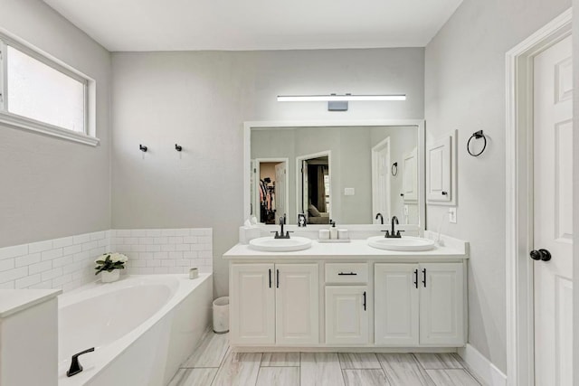 2407 Powderham Ln S, Cedar Park, TX 78613 - full bath featuring a bath and double vanity