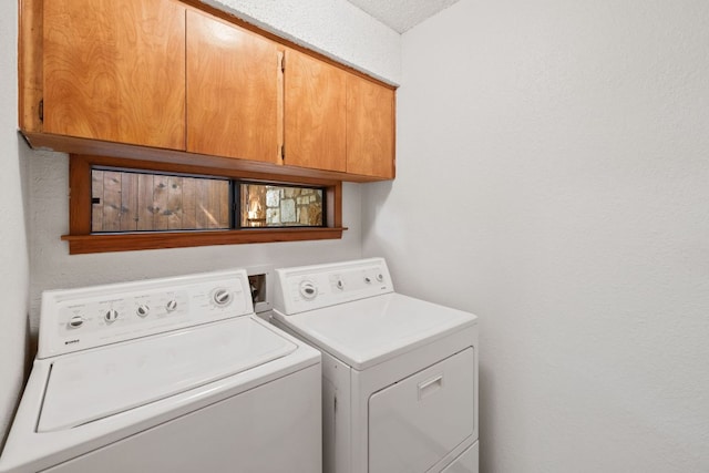 2309 Westoak Dr, Austin, TX 78704 - washroom with cabinet space and washing machine and dryer