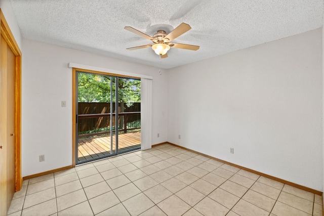 2309 Westoak Dr, Austin, TX 78704 - spare room with ceiling fan, a textured ceiling, and baseboards