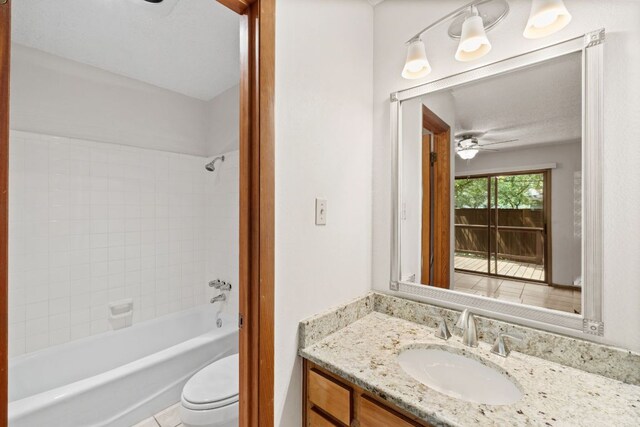 2309 Westoak Dr, Austin, TX 78704 - full bath featuring vanity, toilet,  shower combination, and a ceiling fan