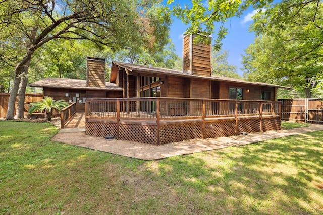 2309 Westoak Dr, Austin, TX 78704 - rear view of property featuring a chimney and a wooden deck