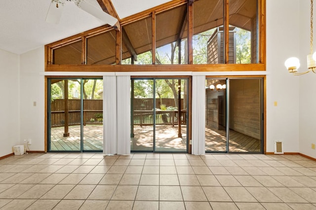 2309 Westoak Dr, Austin, TX 78704 - doorway to outside with tile patterned flooring, high vaulted ceiling, healthy amount of natural light, a chandelier, and beam ceiling