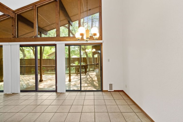 2309 Westoak Dr, Austin, TX 78704 - doorway featuring a chandelier, baseboards, high vaulted ceiling, light tile patterned floors, and beamed ceiling