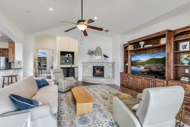 9501 Derecho Bnd, Austin, TX 78737 - living area with a ceiling fan, a brick fireplace, arched walkways, recessed lighting, and high vaulted ceiling