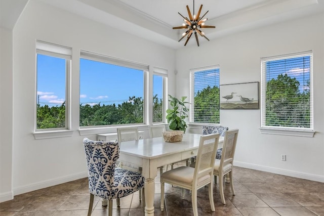 9501 Derecho Bnd, Austin, TX 78737 - dining area featuring plenty of natural light, baseboards, tile patterned flooring, a chandelier, and ornamental molding