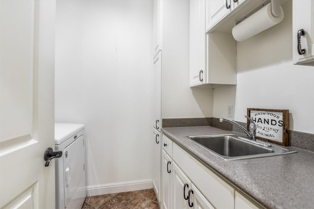 9501 Derecho Bnd, Austin, TX 78737 - washroom featuring washing machine and clothes dryer, cabinet space, and baseboards