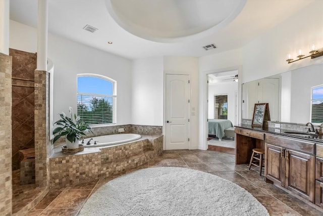 9501 Derecho Bnd, Austin, TX 78737 - full bathroom with a bath, vanity, a ceiling fan, tile patterned flooring, and ensuite bath