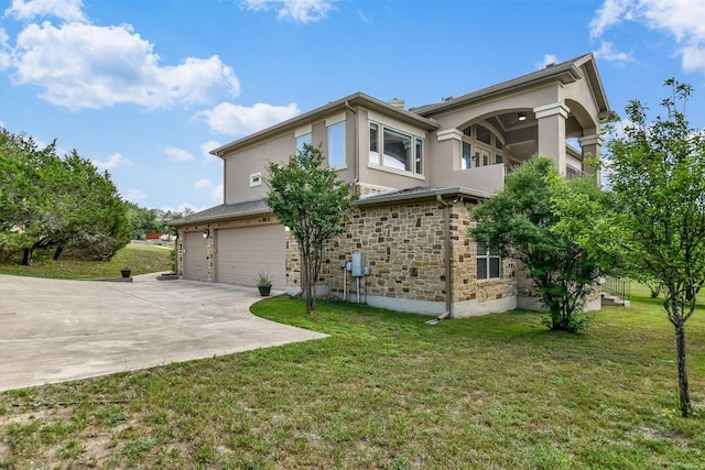 9501 Derecho Bnd, Austin, TX 78737 - view of side of home with stucco siding, concrete driveway, an attached garage, and a yard