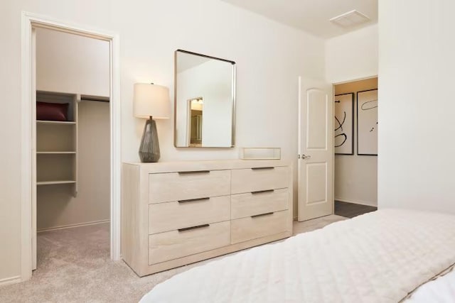 814 Cherrystone Loop, Buda, TX 78610 - unfurnished bedroom with light colored carpet, a closet, a spacious closet, and baseboards