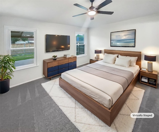 126 Waterlily Way, Hutto, TX 78634 - bedroom with multiple windows and ceiling fan