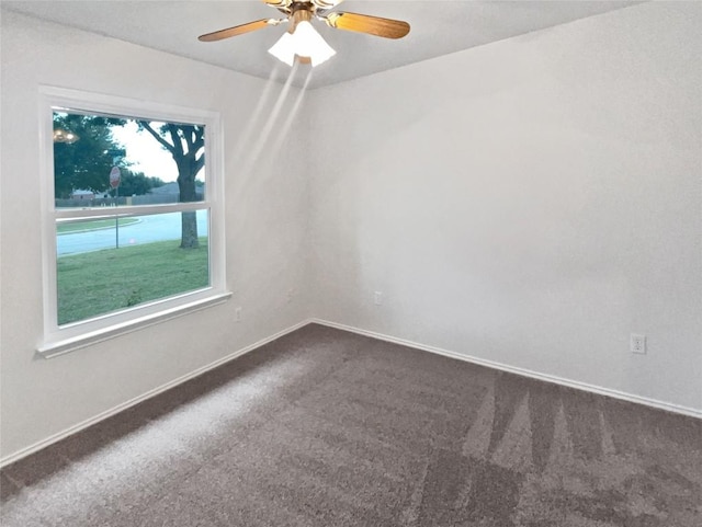 126 Waterlily Way, Hutto, TX 78634 - unfurnished room featuring dark carpet and ceiling fan