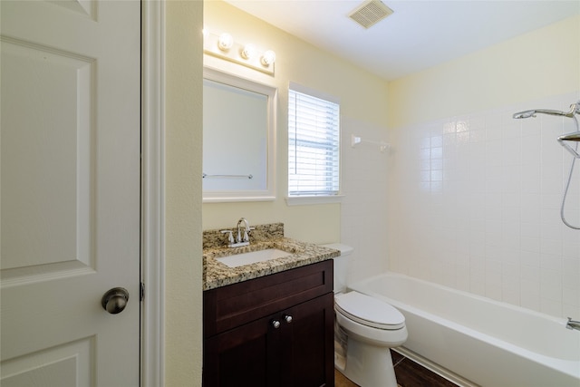 1301 Chardonnay Xing, Leander, TX 78641 - bathroom featuring toilet, vanity, and bathing tub / shower combination