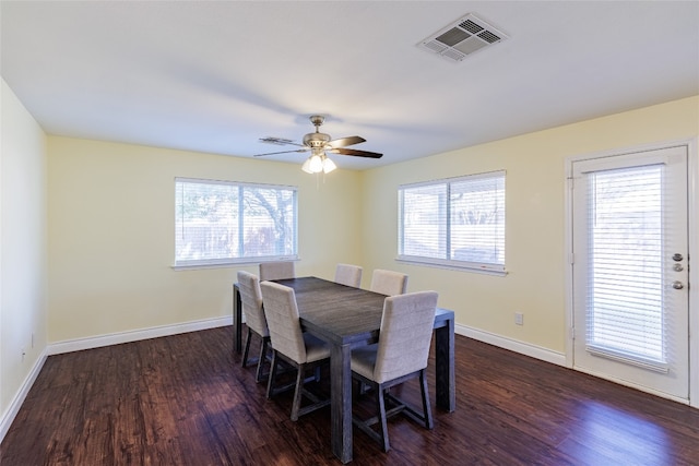 1301 Chardonnay Xing, Leander, TX 78641 - dining room featuring dark wood-style flooring, baseboards, and a ceiling fan