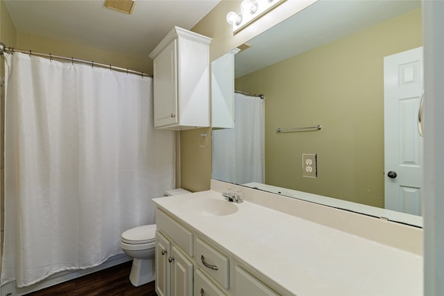 1301 Chardonnay Xing, Leander, TX 78641 - bathroom with toilet, wood finished floors, vanity, and a shower with curtain