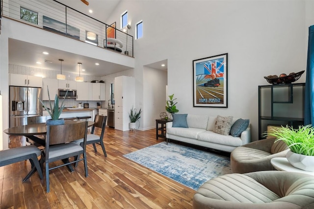 2001 Whitebead Trl, Austin, TX 78734 - living room with a towering ceiling and light wood finished floors