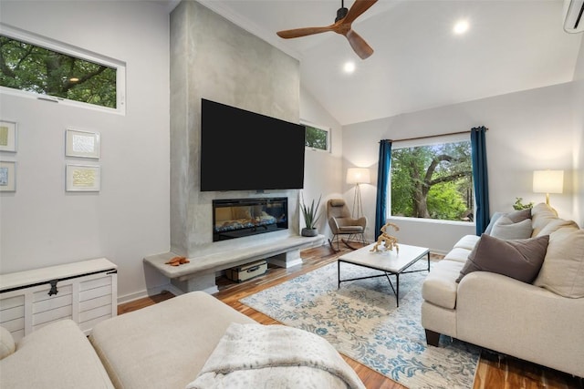 2001 Whitebead Trl, Austin, TX 78734 - living room with a ceiling fan, wood finished floors, an AC wall unit, baseboards, and recessed lighting