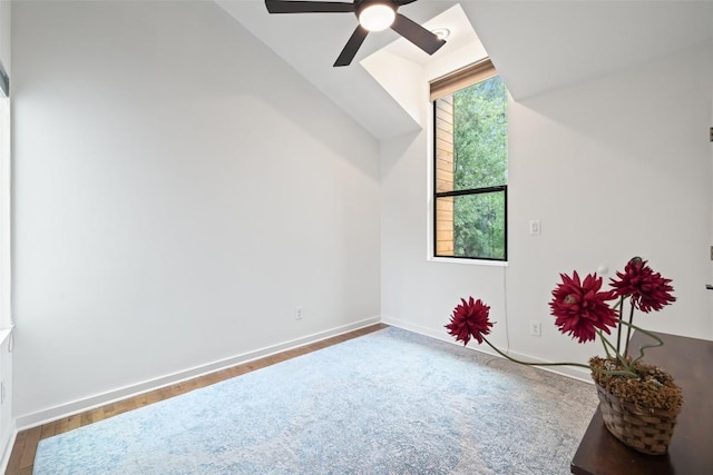 2001 Whitebead Trl, Austin, TX 78734 - unfurnished room with a ceiling fan, vaulted ceiling, baseboards, and wood finished floors