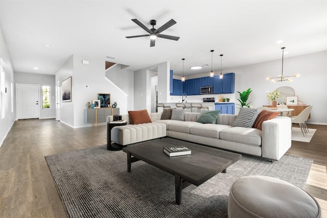 223 Hunters Brk, San Antonio, TX 78253 - living area featuring wood finished floors, baseboards, a chandelier, recessed lighting, and a ceiling fan