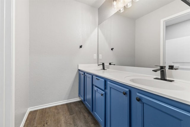 223 Hunters Brk, San Antonio, TX 78253 - full bath with wood finished floors, double vanity, and baseboards