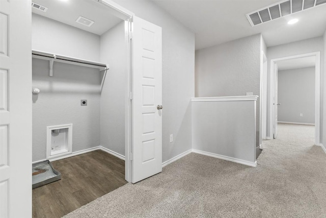223 Hunters Brk, San Antonio, TX 78253 - laundry room with electric dryer hookup, baseboards, carpet, and wood finished floors