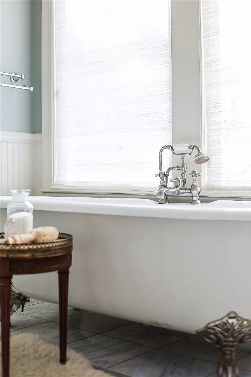 3202 Beverly Rd, Austin, TX 78703 - bathroom with a freestanding bath and wainscoting