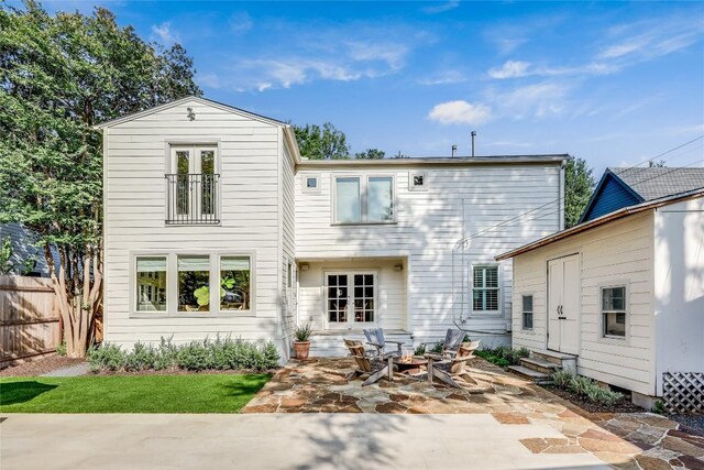 3202 Beverly Rd, Austin, TX 78703 - rear view of house with entry steps, a patio, and a fire pit