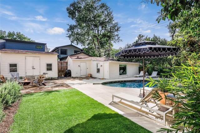 3202 Beverly Rd, Austin, TX 78703 - rear view of house featuring a patio area, an outdoor structure, an outdoor pool, and a gazebo