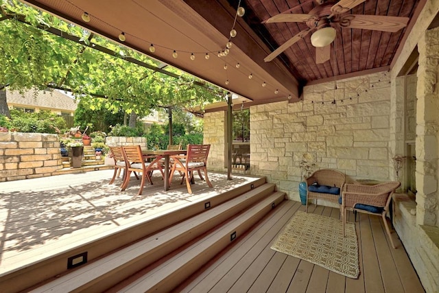 601 Harris Dr, Austin, TX 78737 - wooden terrace with ceiling fan and outdoor dining area