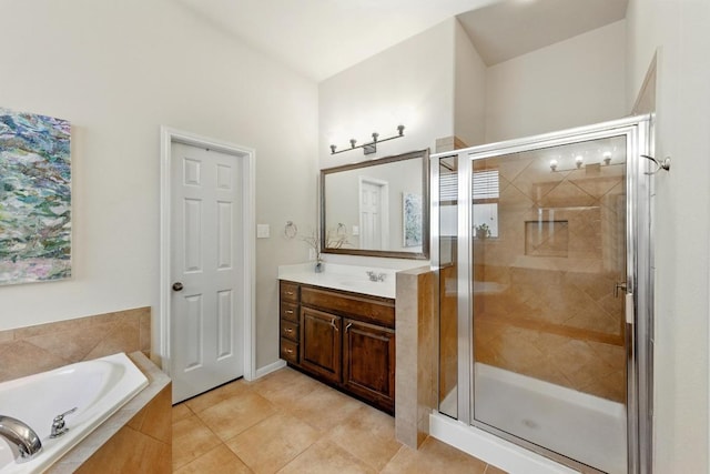601 Harris Dr, Austin, TX 78737 - bathroom featuring a bath, a shower stall, vanity, and tile patterned flooring