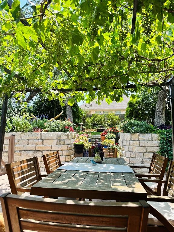 601 Harris Dr, Austin, TX 78737 - view of patio / terrace featuring outdoor dining space