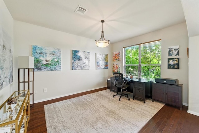 601 Harris Dr, Austin, TX 78737 - home office with dark wood finished floors and baseboards