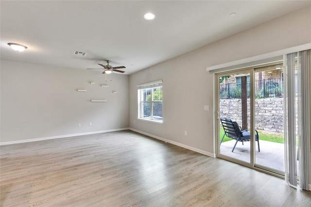 516 E Slaughter Ln Unit 2303, Austin, TX 78744 - unfurnished room featuring ceiling fan, wood finished floors, baseboards, and recessed lighting