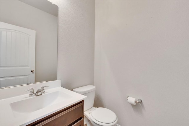 516 E Slaughter Ln Unit 2303, Austin, TX 78744 - half bathroom with toilet and vanity