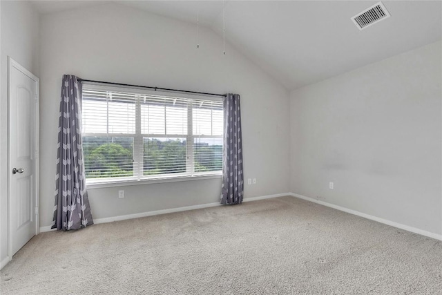 516 E Slaughter Ln Unit 2303, Austin, TX 78744 - spare room with carpet floors, lofted ceiling, and baseboards