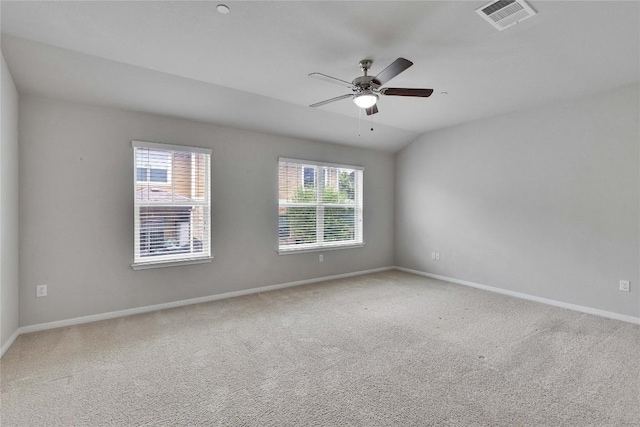 516 E Slaughter Ln Unit 2303, Austin, TX 78744 - spare room featuring carpet floors, baseboards, and ceiling fan