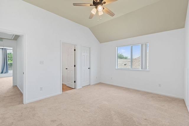 16304 Fincastle Dr, Austin, TX 78717 - unfurnished bedroom featuring attic access, light colored carpet, baseboards, lofted ceiling, and a ceiling fan