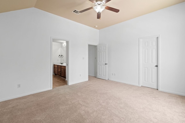 16304 Fincastle Dr, Austin, TX 78717 - unfurnished bedroom featuring light colored carpet, baseboards, ensuite bathroom, and vaulted ceiling