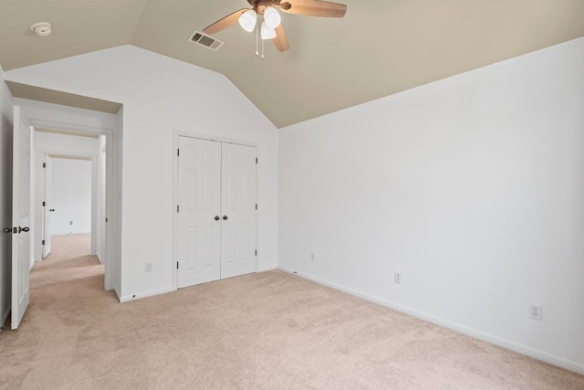 16304 Fincastle Dr, Austin, TX 78717 - unfurnished bedroom with vaulted ceiling, light carpet, baseboards, a closet, and a ceiling fan