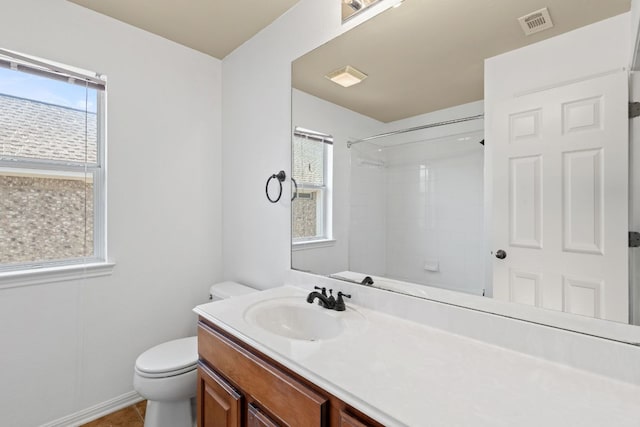 16304 Fincastle Dr, Austin, TX 78717 - bathroom with toilet, vanity, a shower, and plenty of natural light