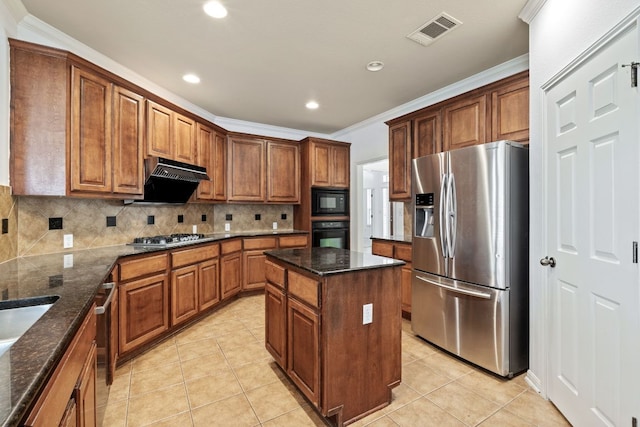 16304 Fincastle Dr, Austin, TX 78717 - kitchen featuring black appliances, ornamental molding, tasteful backsplash, light tile patterned floors, and brown cabinets