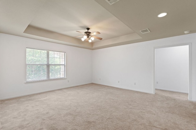 16304 Fincastle Dr, Austin, TX 78717 - spare room with a tray ceiling, ceiling fan, light carpet, baseboards, and recessed lighting
