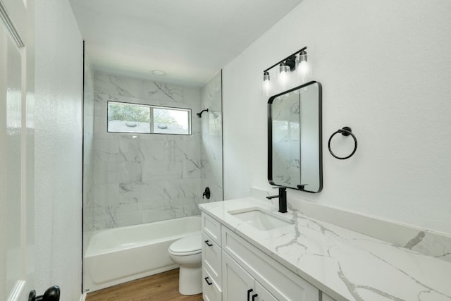 2106 Lobelia Dr, Cedar Park, TX 78613 - full bathroom with vanity, toilet, shower / tub combination, and wood finished floors