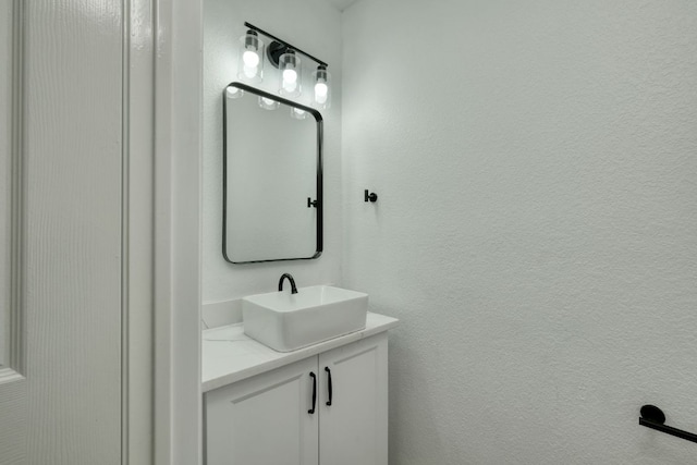 2106 Lobelia Dr, Cedar Park, TX 78613 - bathroom featuring vanity and a textured wall