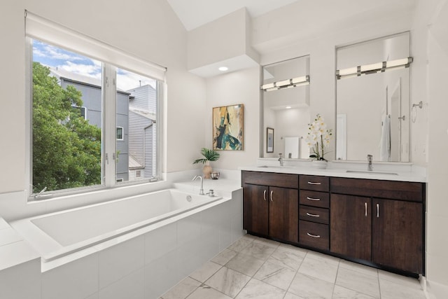 1500 Summit St Unit 4, Austin, TX 78741 - full bathroom with double vanity, a bath, and marble finish flooring