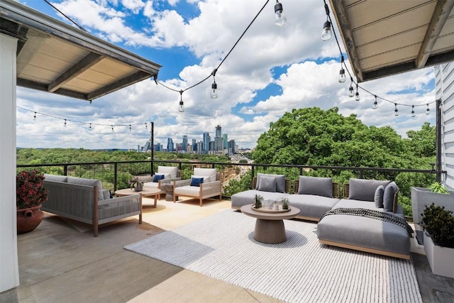 1500 Summit St Unit 4, Austin, TX 78741 - view of patio / terrace featuring an outdoor hangout area and a view of skyline
