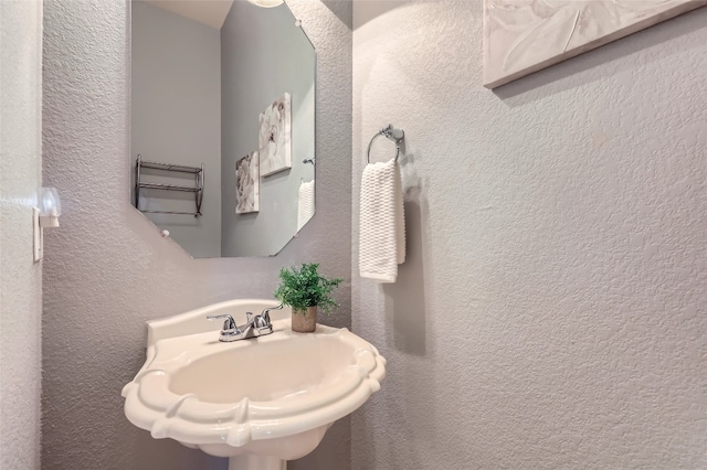 2503 Kinclaven Ct, Cedar Park, TX 78613 - bathroom featuring a textured wall and a sink
