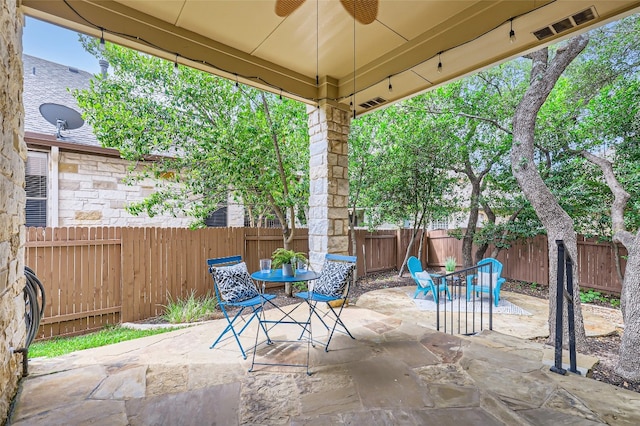2503 Kinclaven Ct, Cedar Park, TX 78613 - fenced backyard featuring outdoor dining space, a ceiling fan, and a patio area