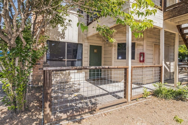 421 W San Antonio St Unit H1, San Marcos, TX 78666 - view of exterior entry with a gate