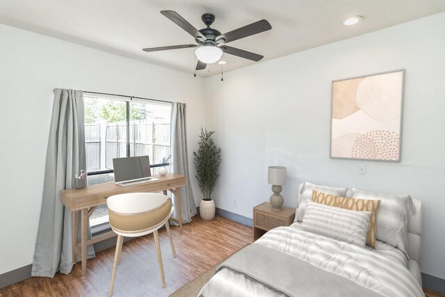 421 W San Antonio St Unit H1, San Marcos, TX 78666 - bedroom with wood finished floors, recessed lighting, and a ceiling fan
